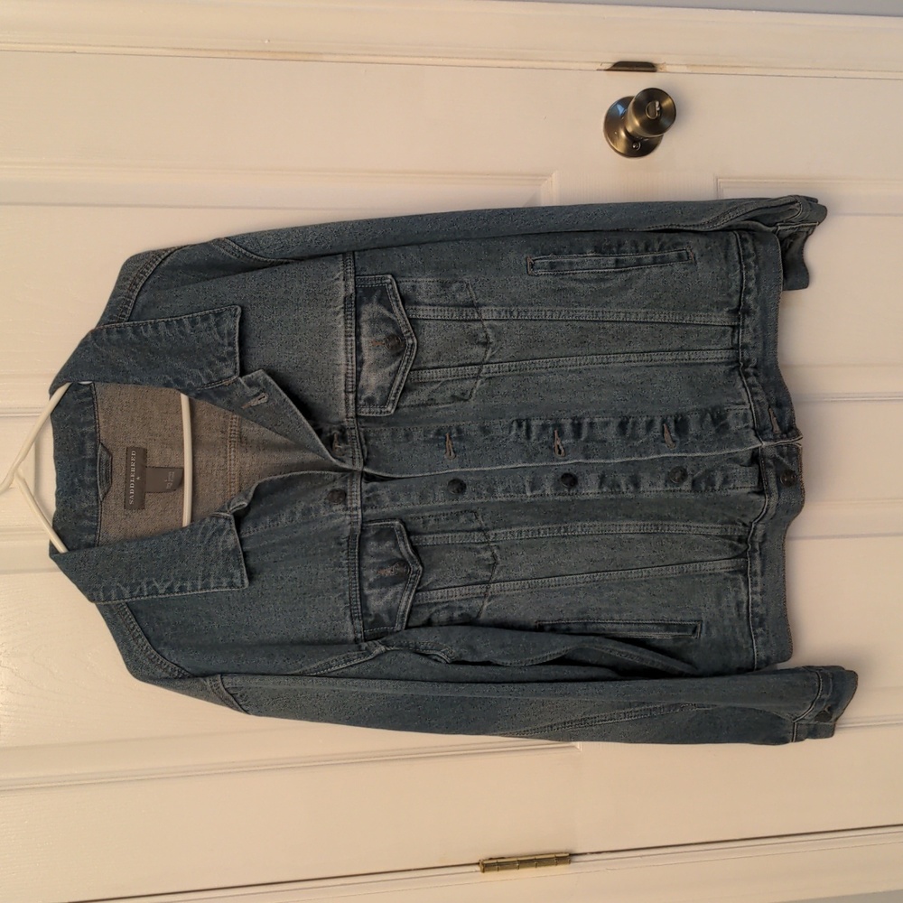 Saddlebred, heavy jean coat. Button front, pocket and cuff.